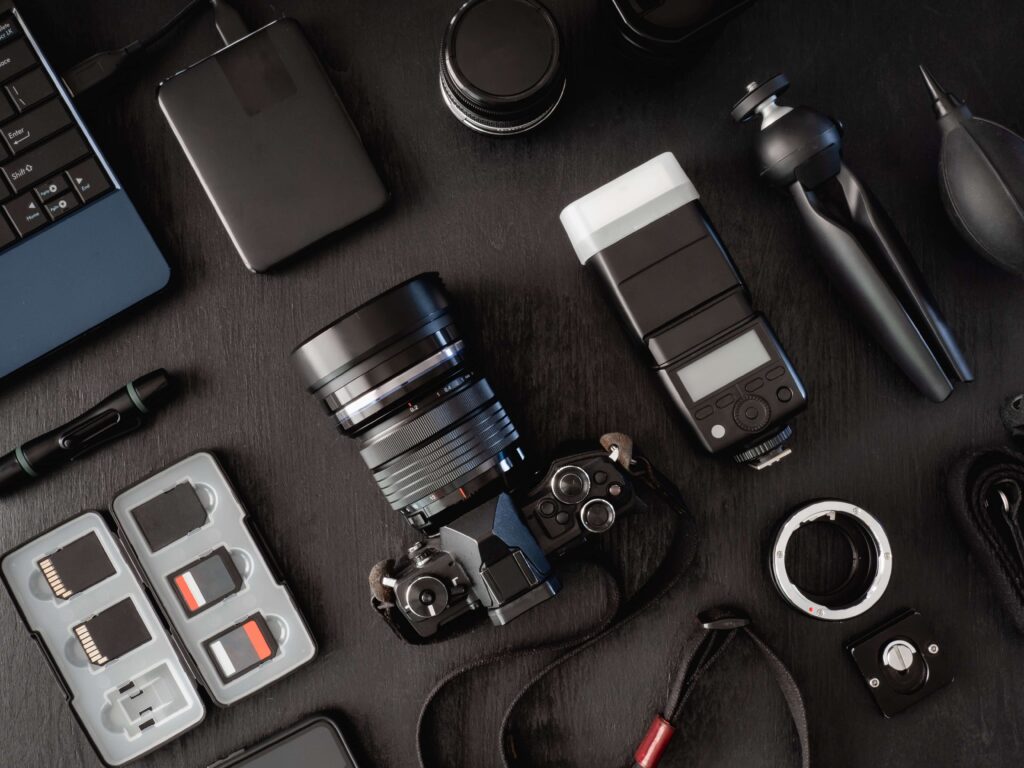 Photography equipment neatly organized on a table